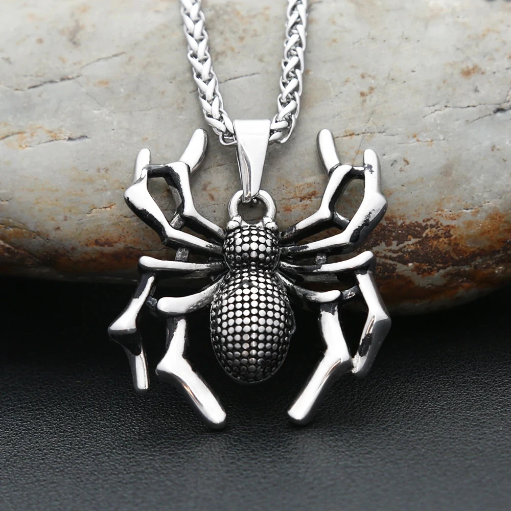 Pendentif araignee face deco caillou