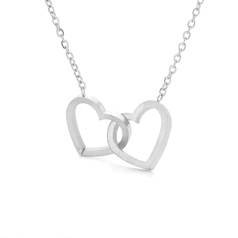 Pendentif coeurs entrelaces argente
