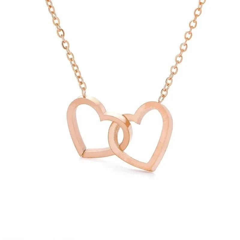 Pendentif coeurs entrelaces or rose