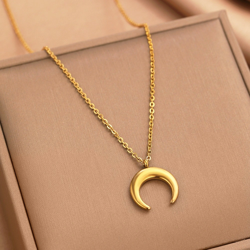 Pendentif lune inversee dore support